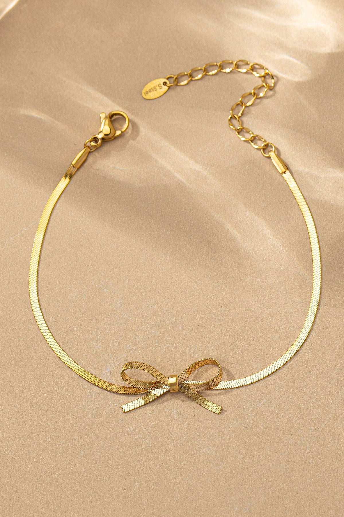 Gold Herringbone Chain Bow Bracelet - BRC3342GD