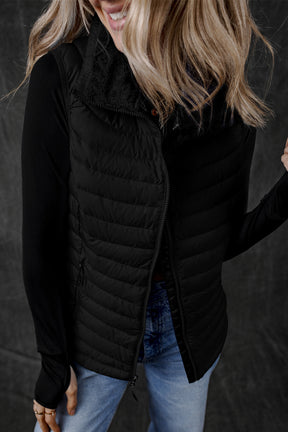 It's the Vest of All Black Zipped Puffer Vest