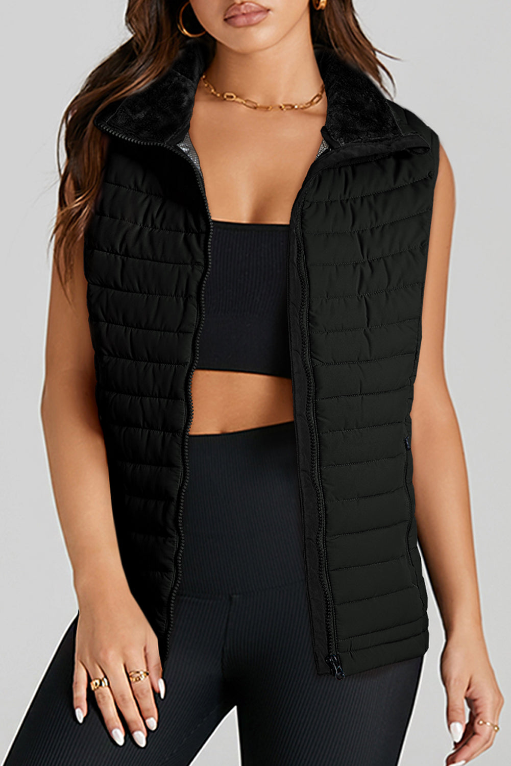 It's the Vest of All Black Zipped Puffer Vest