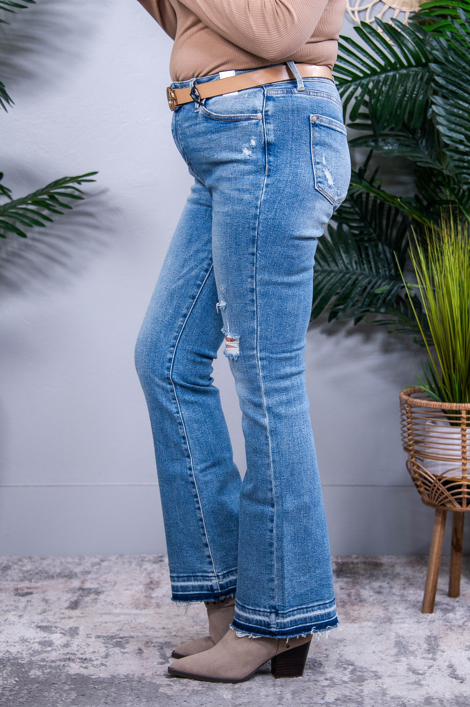 Isla Mid Rise Distressed Released Hem Bootcut Jeans