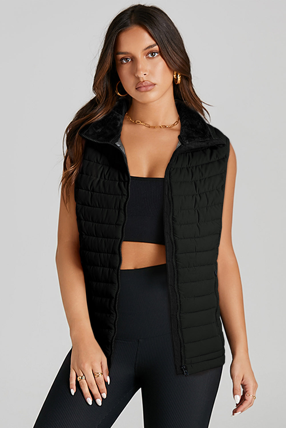 It's the Vest of All Black Zipped Puffer Vest